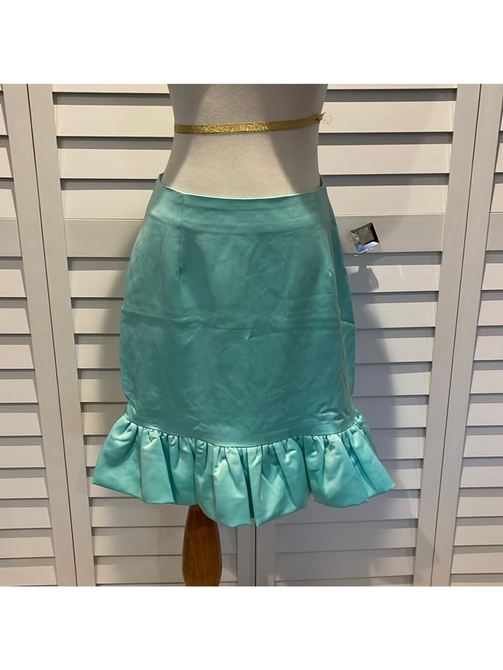 Naked Wardrobe the Statement NWOT Skirt in a Satin finish with a bottom Ruffle.